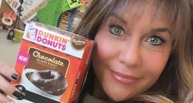 Lisa Lillien with Dunkin Donuts Chocolate Donut