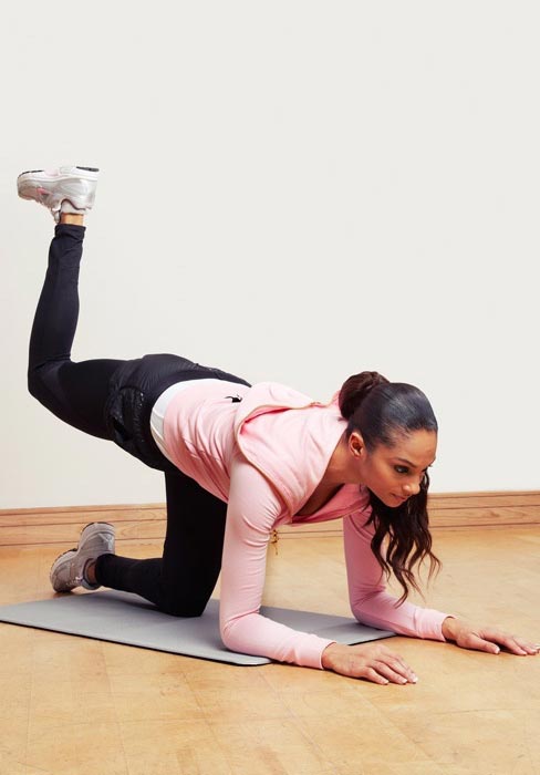 Alesha Dixon doing yoga