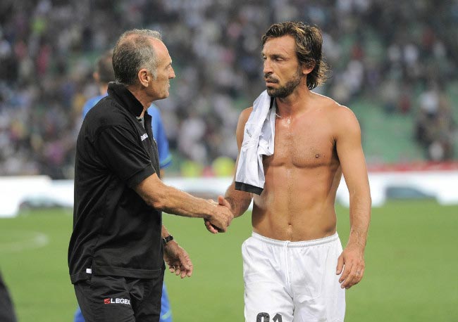 Andrea Pirlo is congratulated by Udinese Calcio coach Francesco Guidolin after Juventus FC victory in 2014