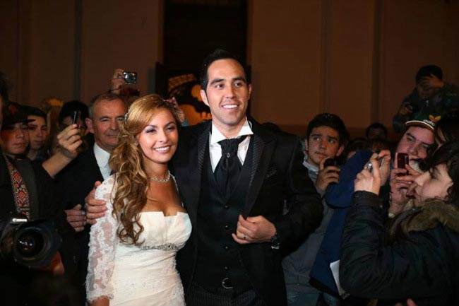 Claudio Bravo and Carlo Pardo beams for the cameras after their wedding in June 2013