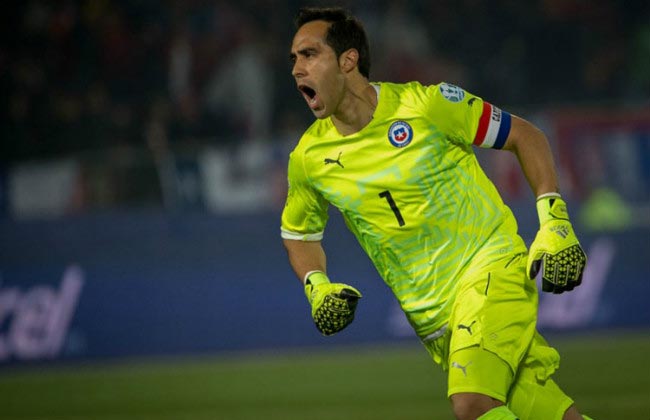 Claudio Bravo wheels away in celebration after saving a penalty in the 2015 Copa America final