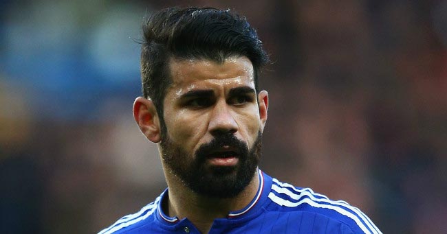 Diego Costa watches on during a home match in the EPL