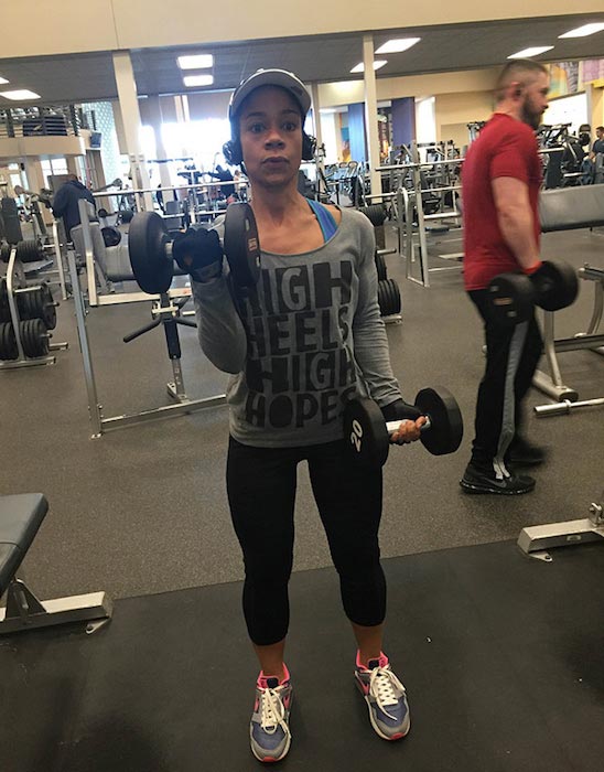 Eve Guzman doing biceps curls