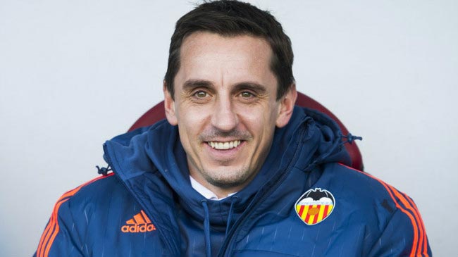 Gary Neville watches on from the home dugout while managing Spanish side Valencia FC in 2015