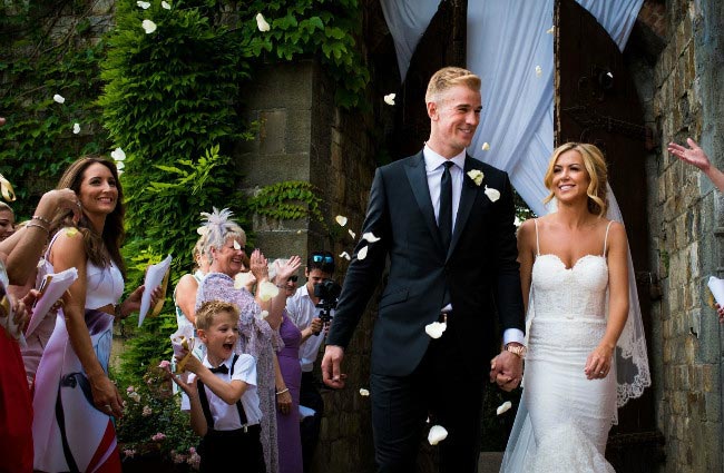 Joe Hart and his wife Kimberly Crew pictured leaving their wedding venue in Florence