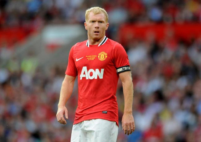 Paul Scholes watches on during his testimonial match held at Old Trafford between Manchester United and New York Cosmos on August 5, 2011