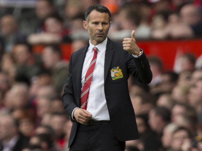 Ryan Giggs on the sidelines at the Old Trafford stadium during his short spell as interim manager in 2014