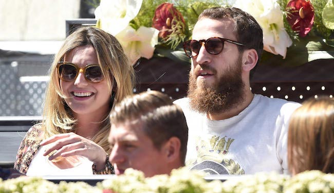 Sergio Rodriguez and Ana Bernal watching tennis match