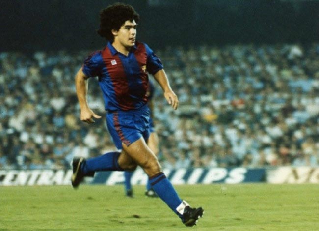 Young Diego Maradona takes a shot in a La Liga match for Barcelona in 1983