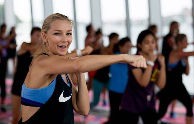 Anna Heinrich working out during a class