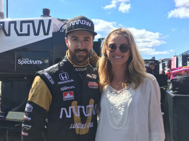 James Hinchcliffe with Rebecca Dalton at a racing event in 2015