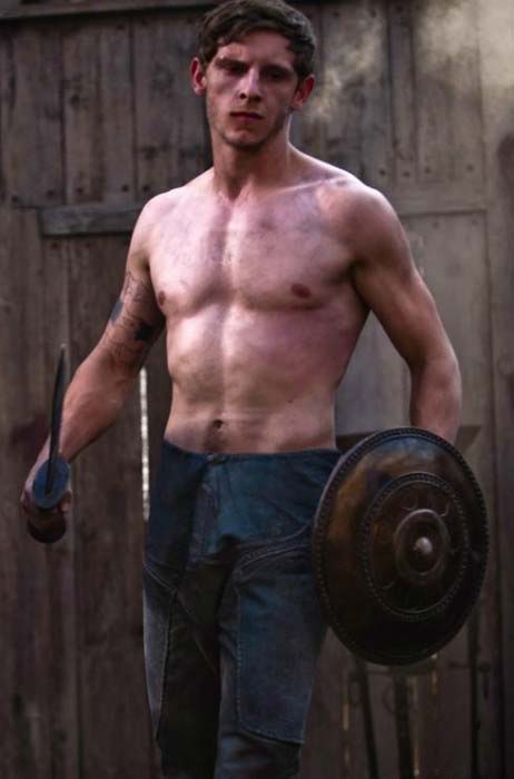 Jamie Bell shows off his toned muscles in shirtless body in a still taken from action movie, The Eagle released in 2011