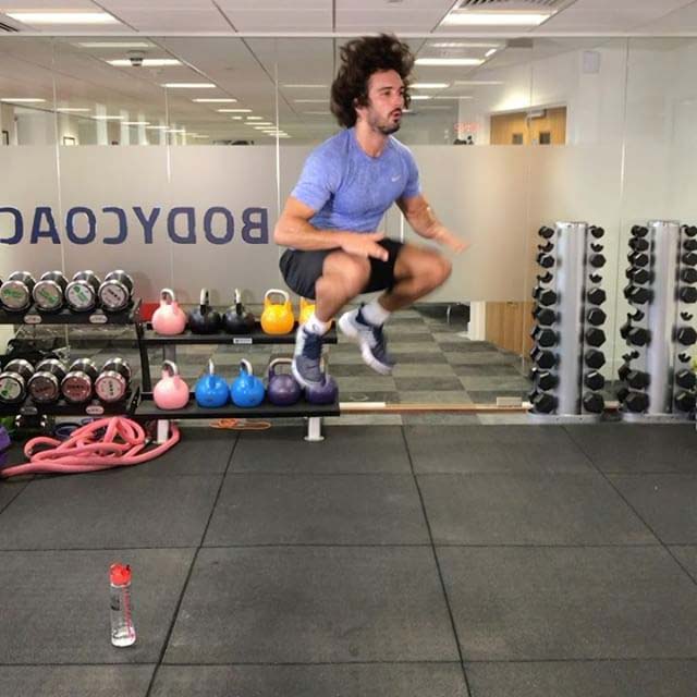 Joe Wicks working out in his gym in November 2016