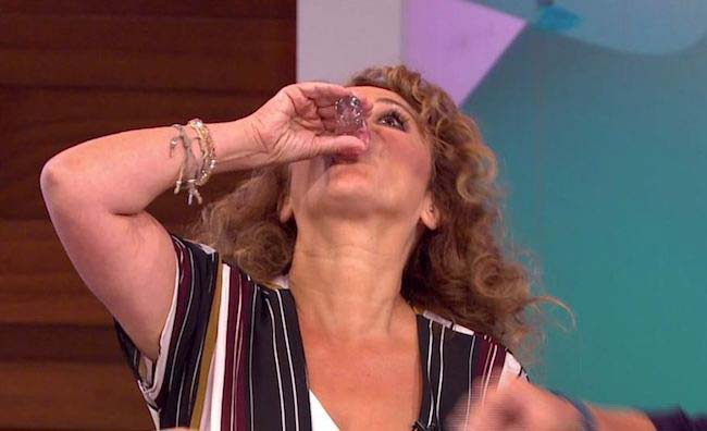 Nadia Sawalha having shots