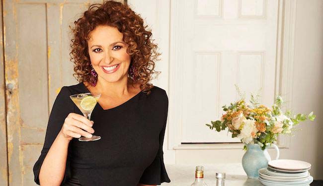 Nadia Sawalha with a drink