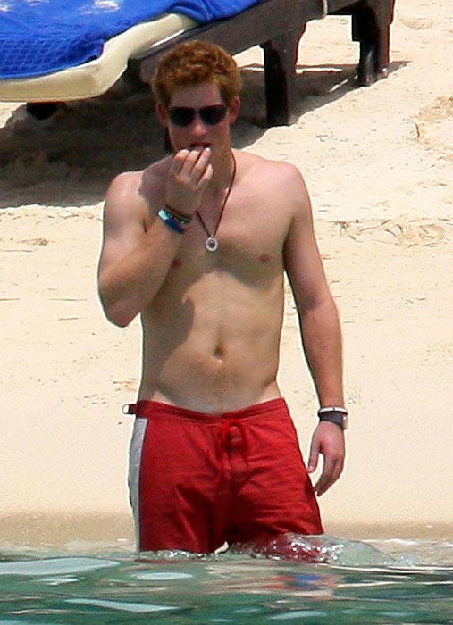 Prince Harry shows off his buff physique while vacationing at Mauritius Island in December 2008