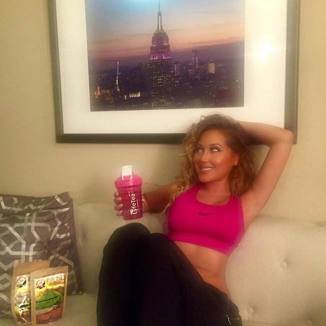 Adrienne Bailon with detox tea