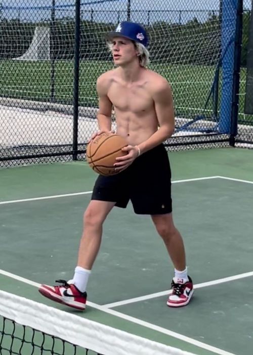 Cruz Beckham playing basketball