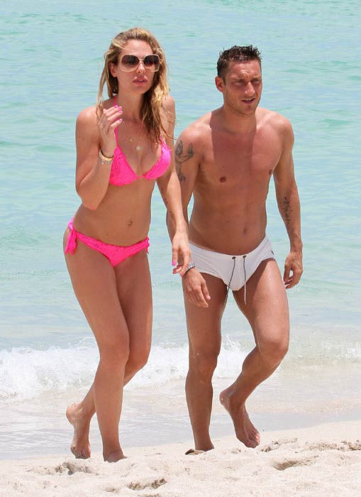 Francesco Totti and wife Ilary Blasi on the Miami beach, Florida on June 7, 2012