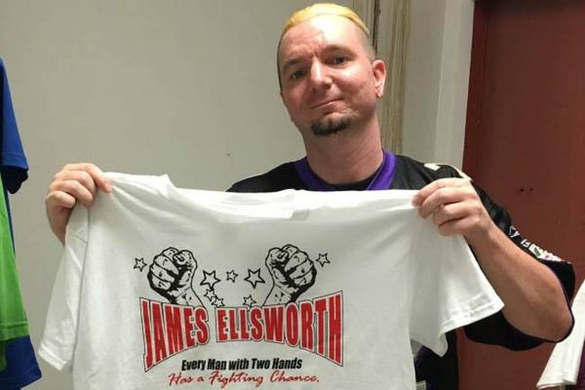 James Ellsworth shows off his WWE merchandise t-shirt