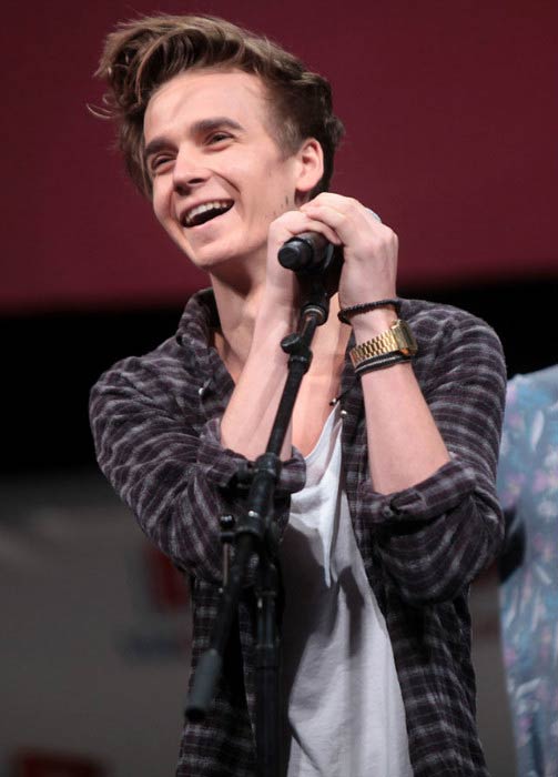 Joe Sugg performs at a public event in 2015
