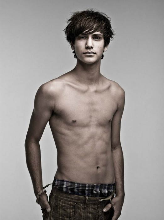 Luke Pasqualino shirtless body in a modeling picture taken in 2011