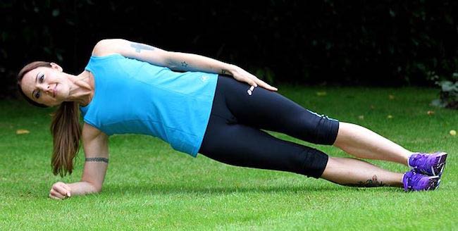 Melanie Chisholm doing side planks