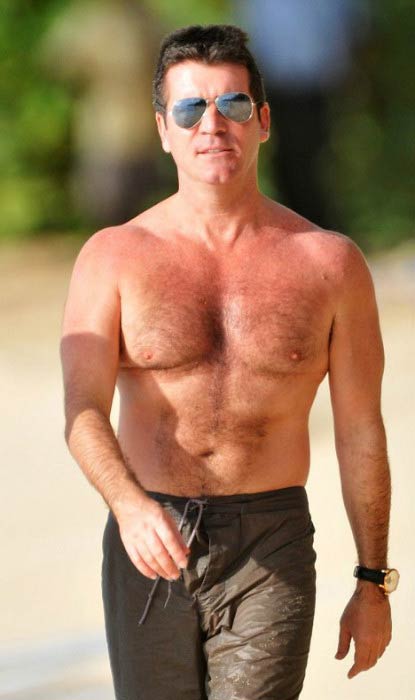 Simon Cowell shirtless body at a Barbados Beach in December 2008