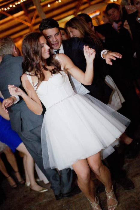 Alex Morgan and Servando Carrasco celebrate at their wedding reception on December 31, 2014