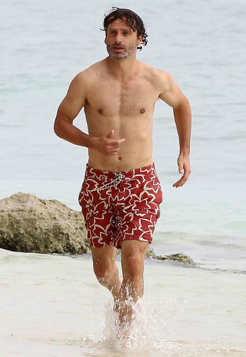 Andrew Lincoln shirtless on the Caribbean beach in August 2013