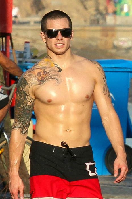 Casper Smart shirtless at a beach in Recife, Brazil in July 2012