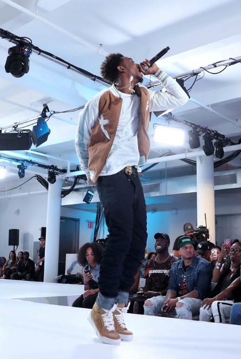Desiigner performing onstage during the BET How To Rock: Denim show in August 2016