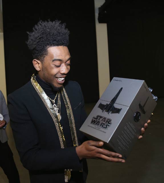 Desiigner with Propel Star Wars Battle Drones at Def Jam's Holiday Party in December 2016