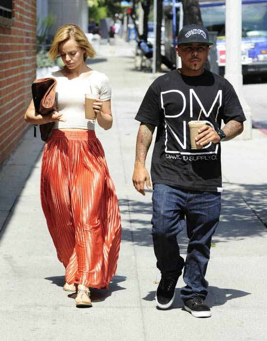 Mena Suvari and Salvador Sanchez leaving Planet Raw restaurant in August 2012