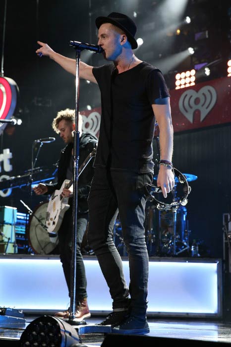 Ryan Tedder performing onstage during iHeartRadio Jingle Ball in December 2014