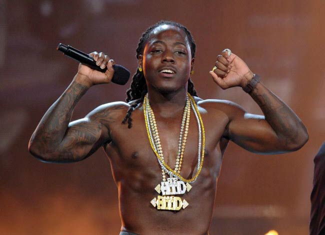 Ace Hood performing shirtless onstage during the BET Awards in June 2011