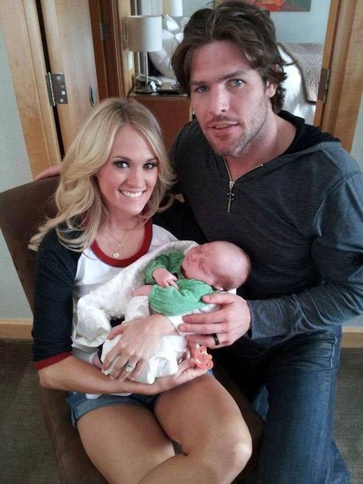 Carrie Underwood and Mike Fisher with their son Isaiah