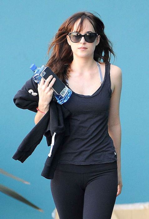 Dakota Johnson after workout heading towards parking lot