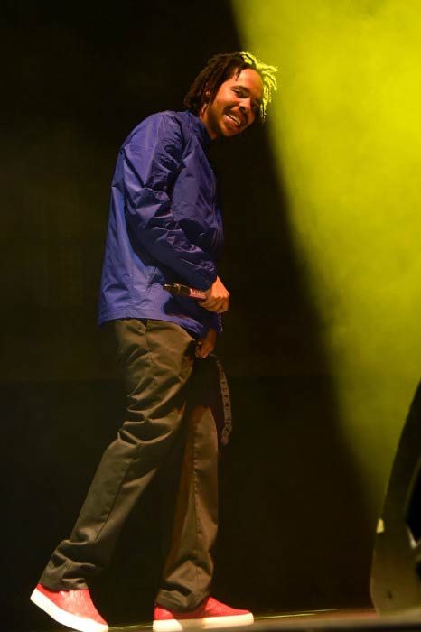 Earl Sweatshirt performing onstage during Tyler, the Creator's 5th Annual Camp Flog Gnaw Carnival in November 2016