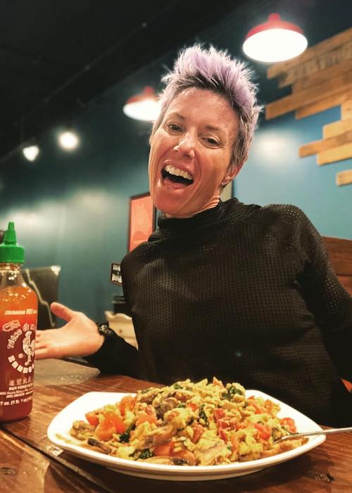 Erin Oprea eating scrambled eggs in October 2018 at Red Bicycle