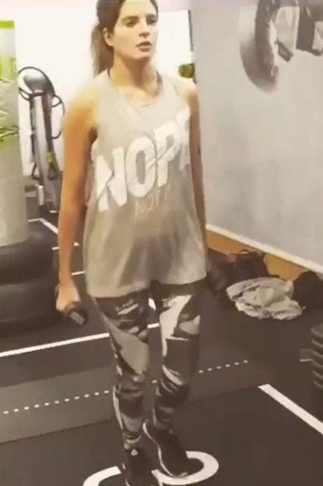 Pregnant Binky Felstead shows off growing baby bump while working out
