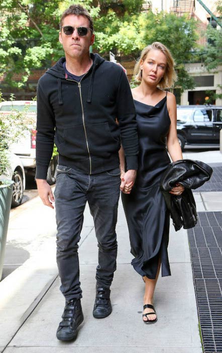 Sam Worthington and Lara Bingle leaving their NYC hotel in September 2014