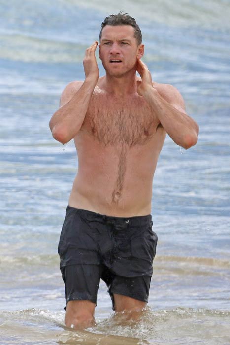 Sam Worthington shirtless at a Hawaii Beach in August 2014