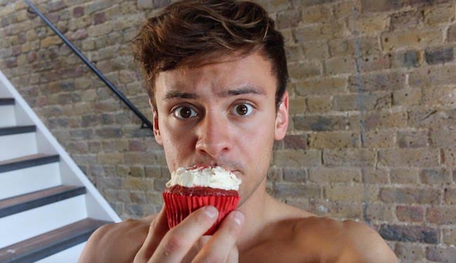 Tom Daley eating a pudding