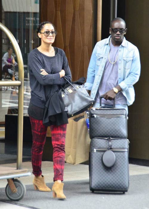 Tracee Ellis Ross and Bu Thiam outside SoHo Trump Hotel in June 2012