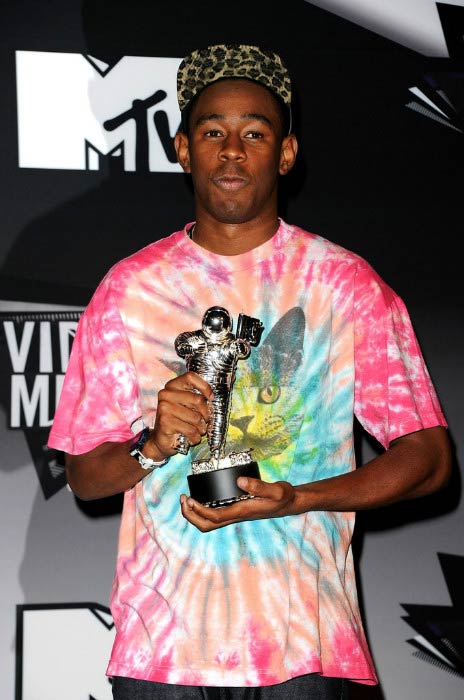 Tyler, The Creator posing with the Best New Artist award during the MTV Video Music Awards in August 2011