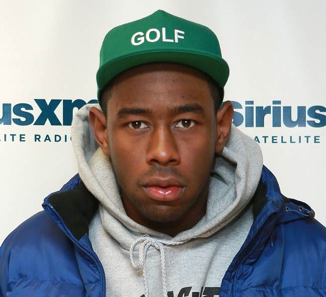 Tyler, The Creator posing during an event