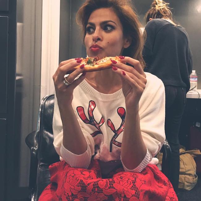 Eva Mendes relishing her pizza slice