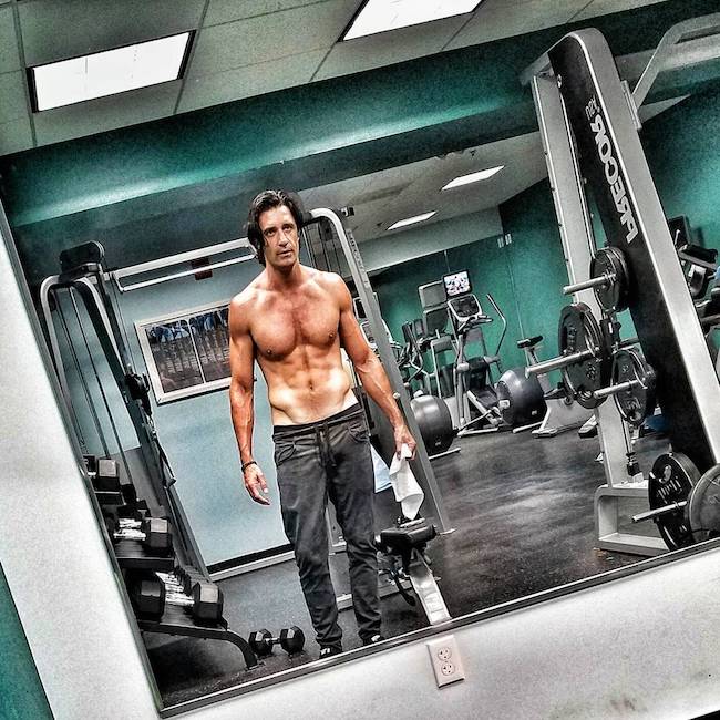 Gilles Marini showing his abs while in gym