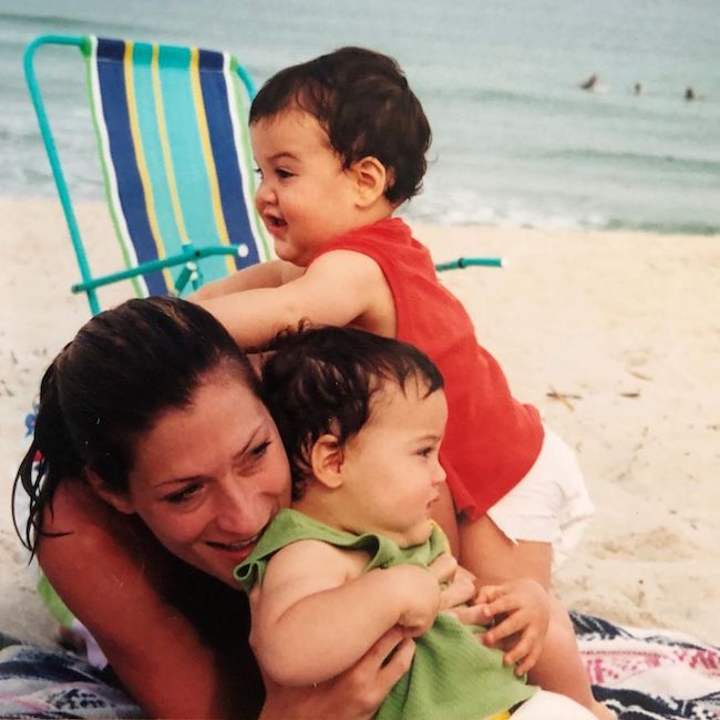 Grayson Dolan (in Green) with his twin brother and mother